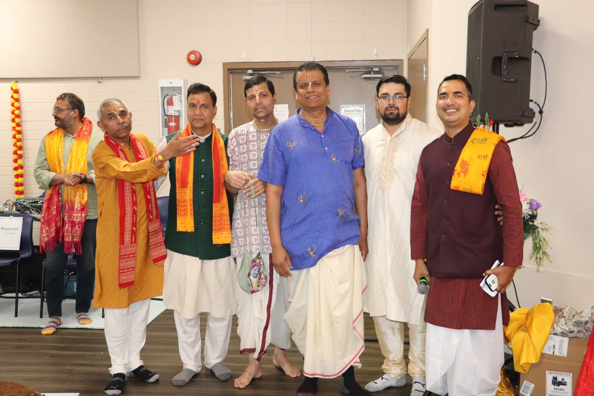 Acharya ji and the puja team gathered together