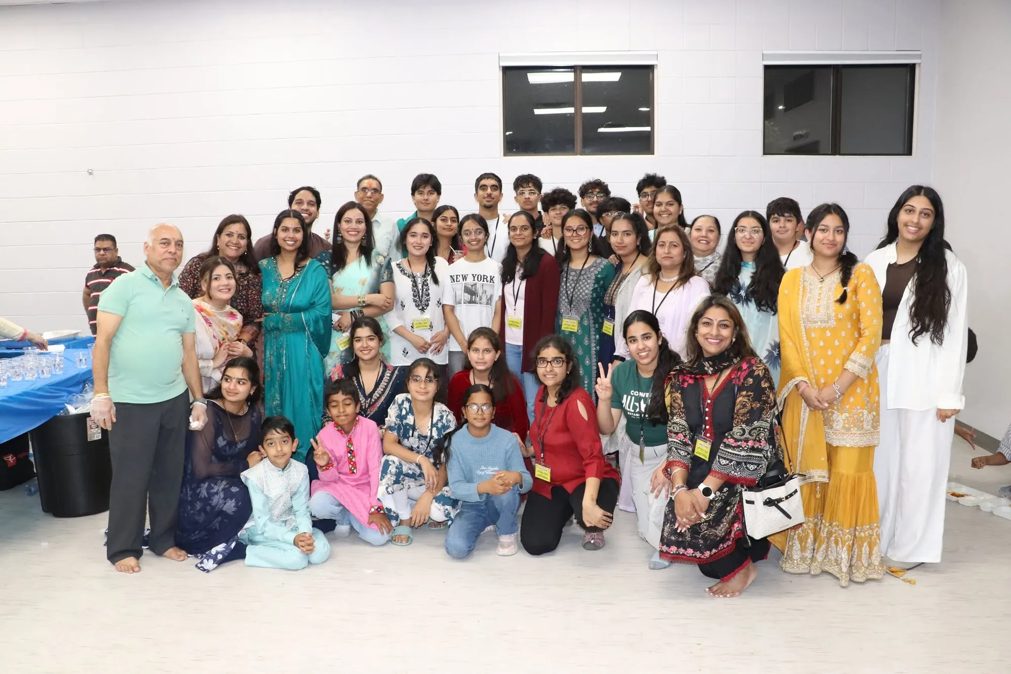 HSNA volunteers and families gathered together in the hall
