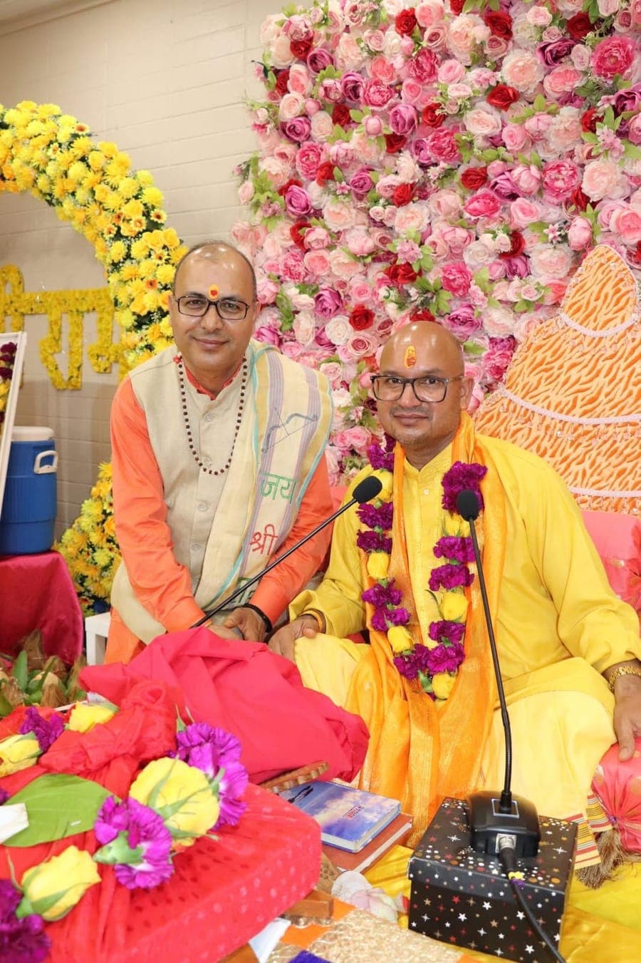 Acharya Vinod Sodiyal and Shastri Deepak Raturi seated together at a Ram Katha