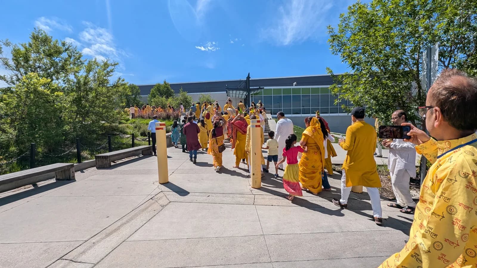 The kalash yatra makes its way to the Genesis Centre