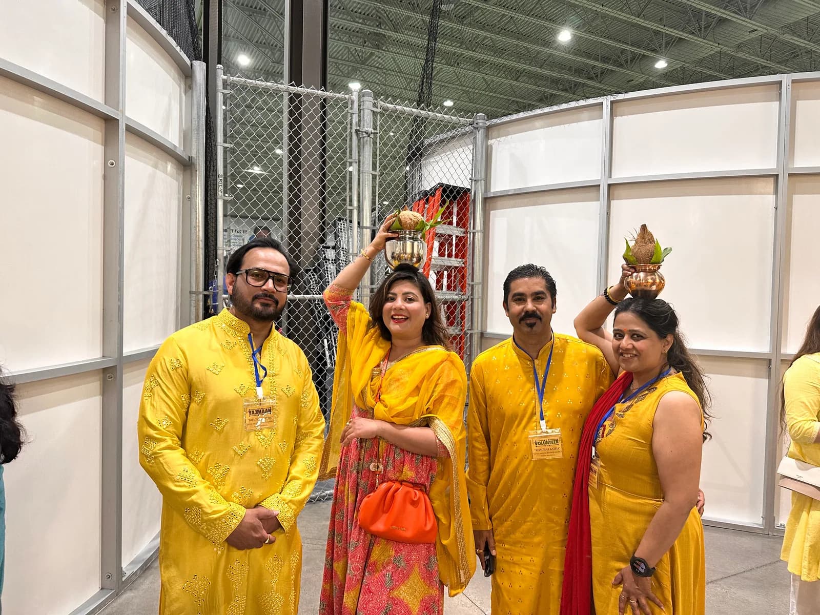 Yajmans gather with their kalash before the evening's katha