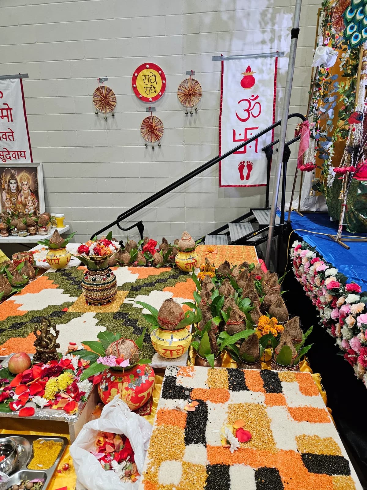 Grains, a kalash, and offerings arranged on the havan vedi