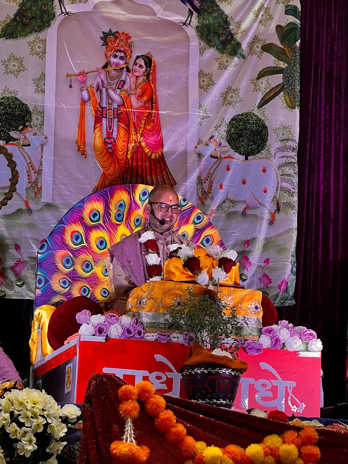 The peacock-decked mandap with Radha and Krishna