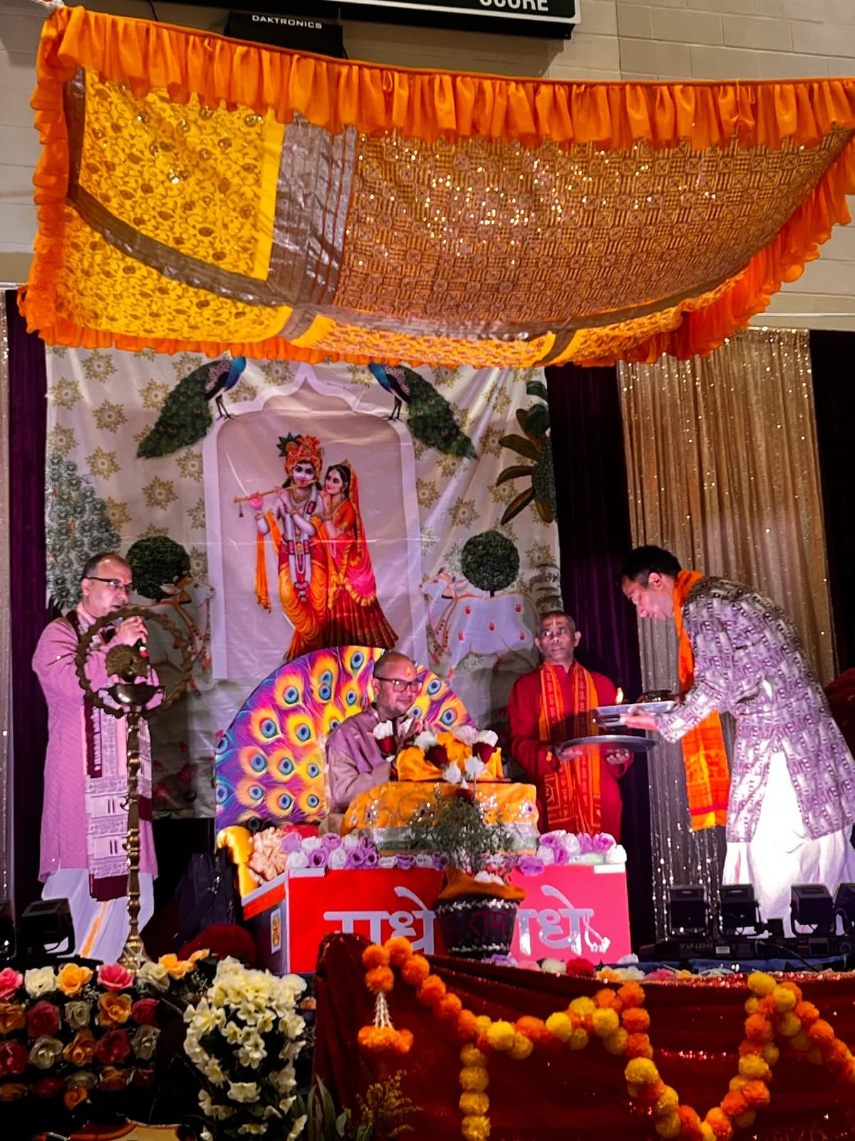 The priest performs the rites at the decorated mandap