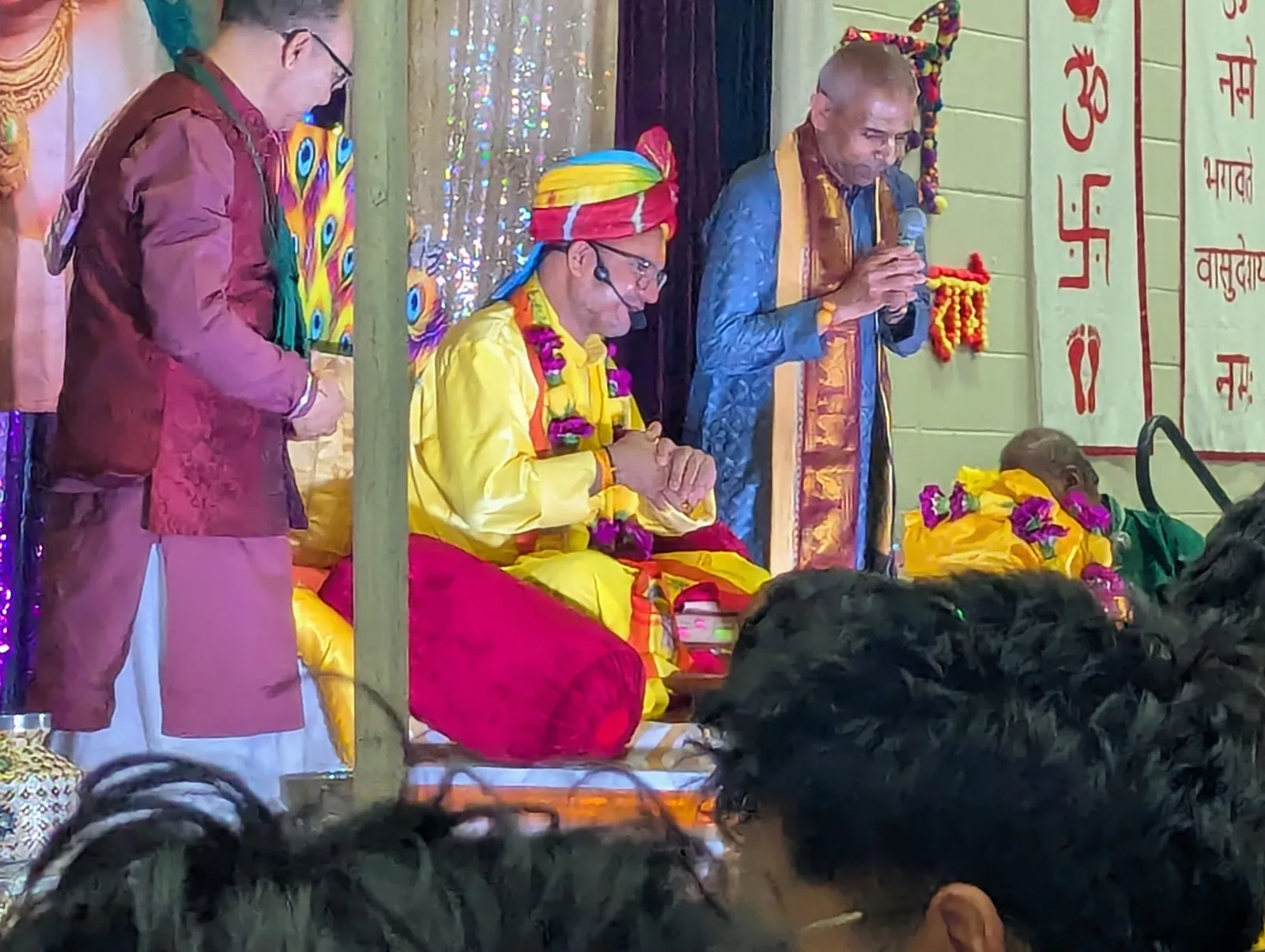 The Katha Vyas performs the rites on stage