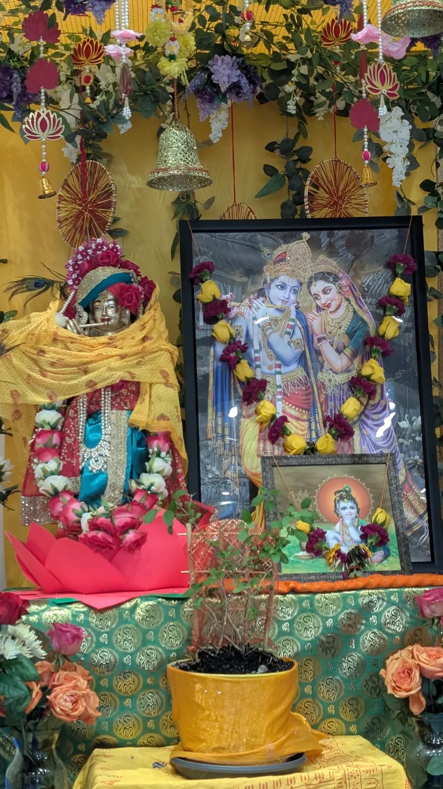 The deities of Radha and Krishna adorned for the evening