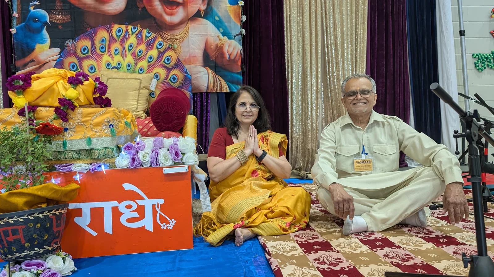 A devotee offers pranam before the mandap