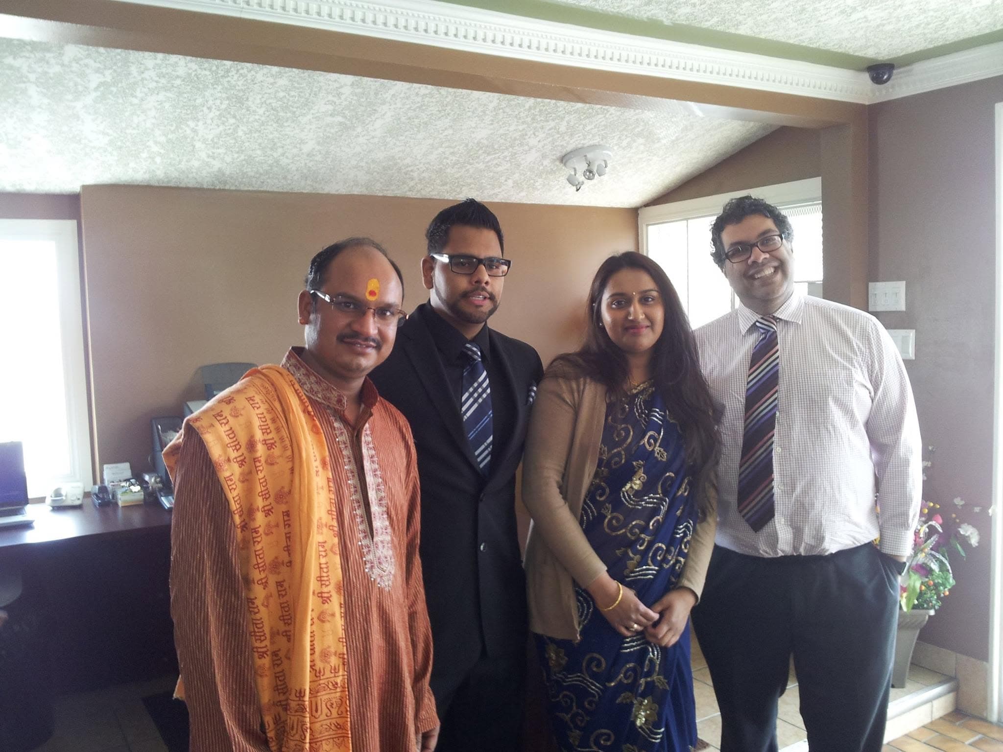 Acharya Vinod Sodiyal with members of the Calgary Hindu community